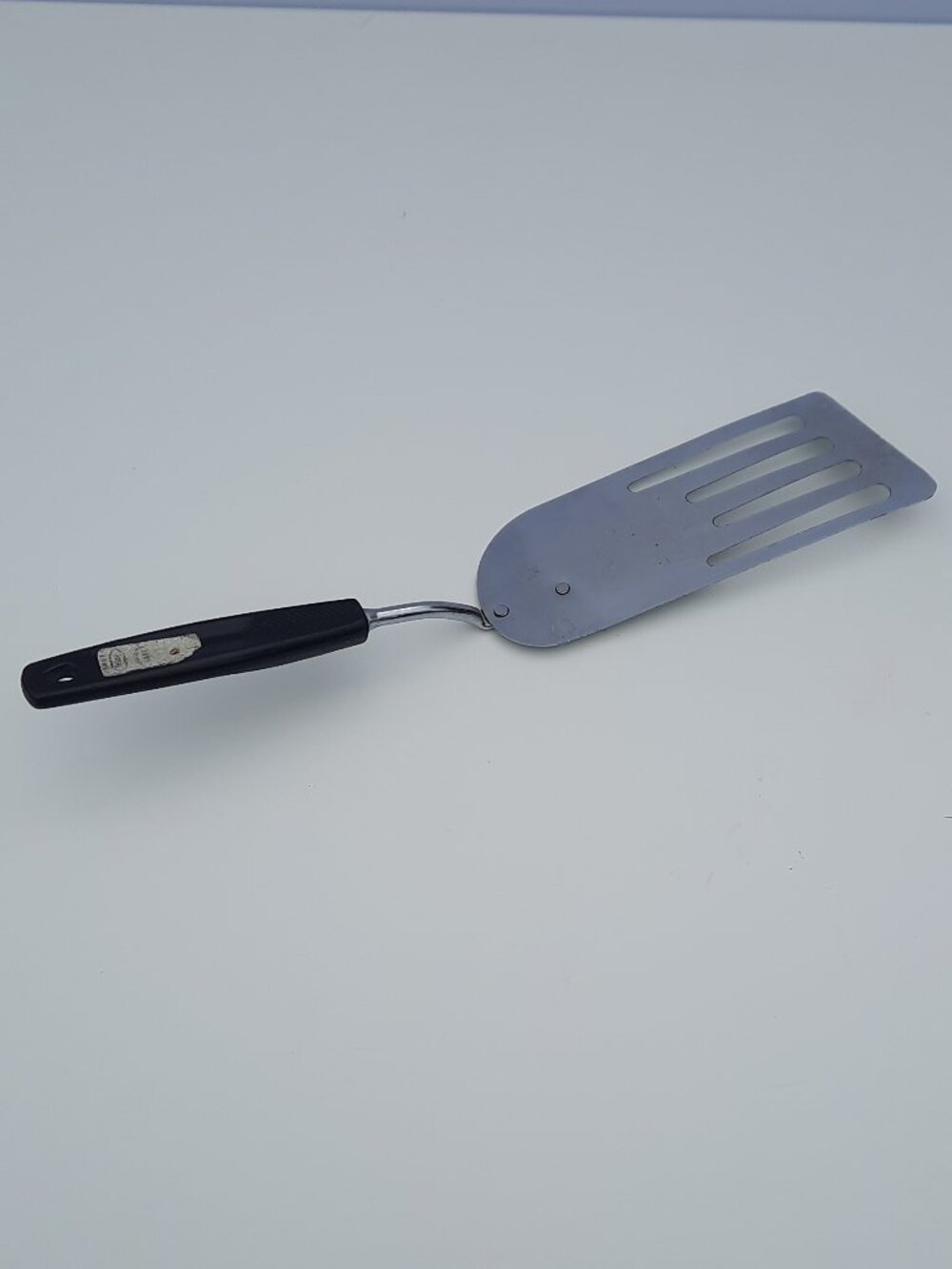 Vintage Foley Slotted Angled Spatula Flexible Blade Black Handle USA